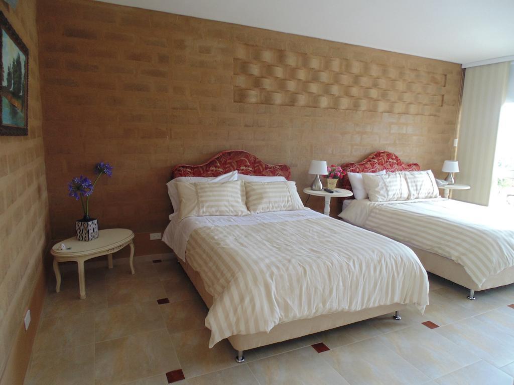Bella Tierra Hotel Boutique 티바소사 객실 사진