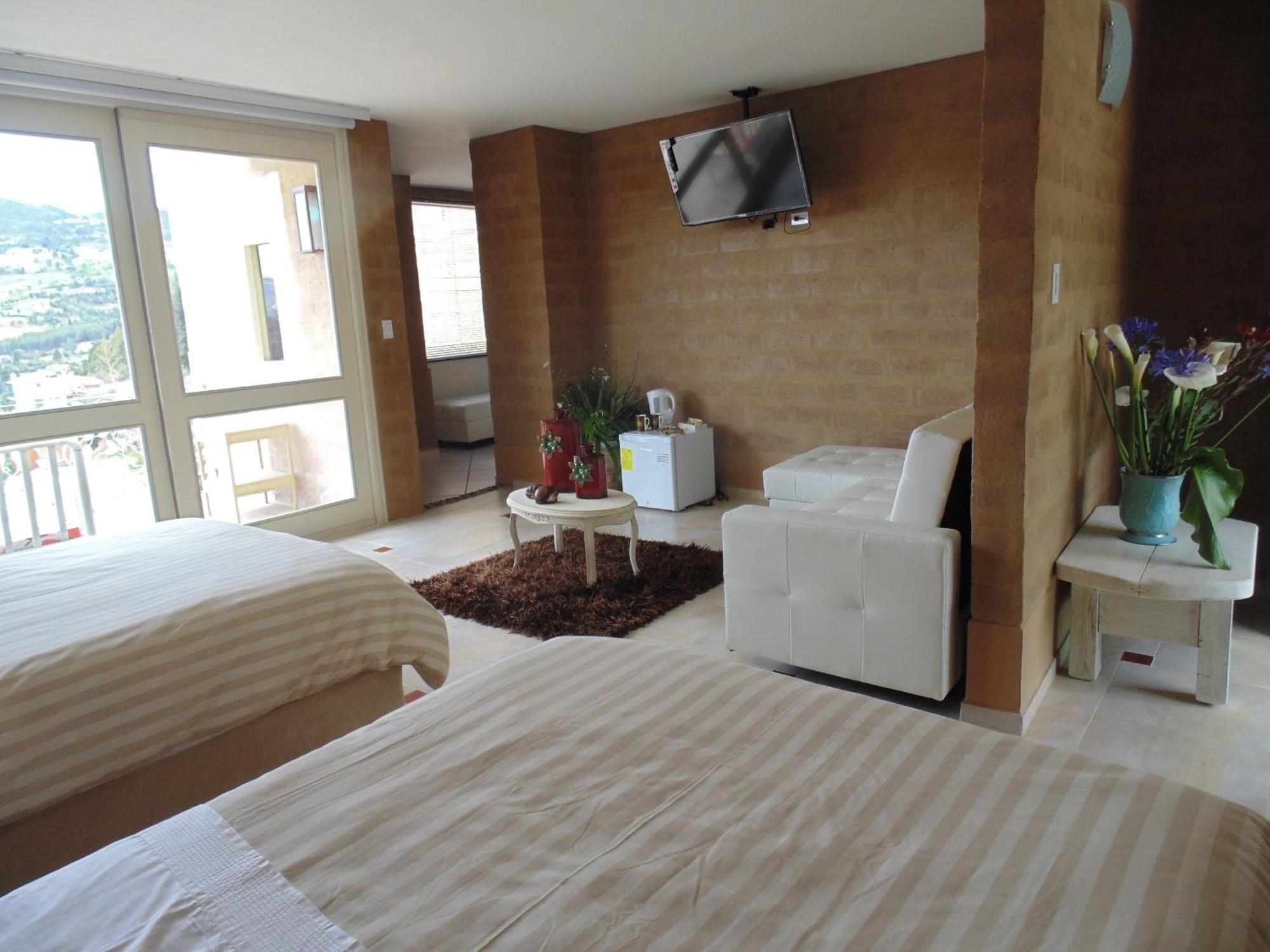 Bella Tierra Hotel Boutique 티바소사 객실 사진