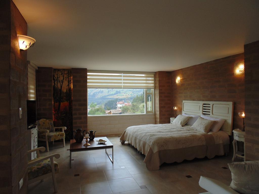 Bella Tierra Hotel Boutique 티바소사 객실 사진